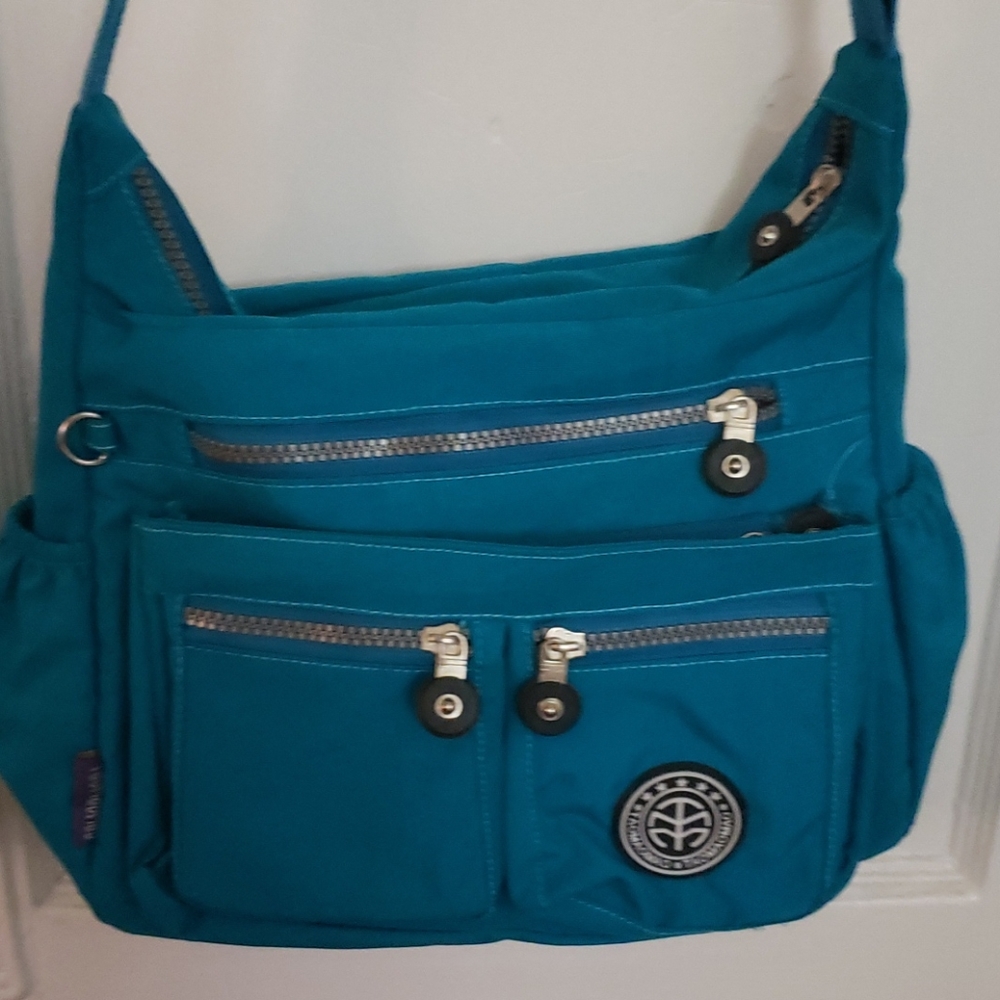 NWT - Turquoise crossbody nylon bag